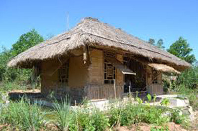 A traditional Vietnamese house - an image of a Vietnamese peaceful and tranquil countryside.