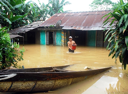 Mùa mưa, lũ lụt làm nhiều nhà dân ở vùng đồng bằng Quảng Nam bị ngập chìm trong nước. Ảnh: MINH HẢI