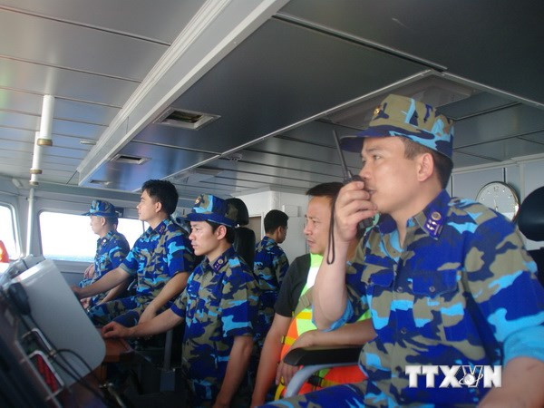 Tàu Cảnh sát biển Việt Nam làm nhiệm vụ thực thi pháp luật tại vùng biển Trung Quốc hạ đặt trái phép giàn khoan Hải Dương-981. (Ảnh: Công Định - Hữu Trung/TTXVN)