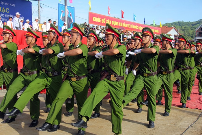 The police force parading in the opening ceremony.