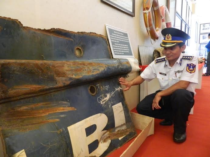 Political instructor Nguyen Quoc Huy of the Vietnamese Coast guard vessel 2016 is moved when seeing the broken pieces of his vessel which was rammed by Chinese ships in April 2014.