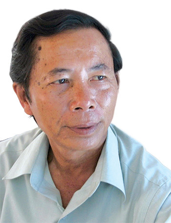 Chân dung nhà văn Nguyễn Bá Thâm.