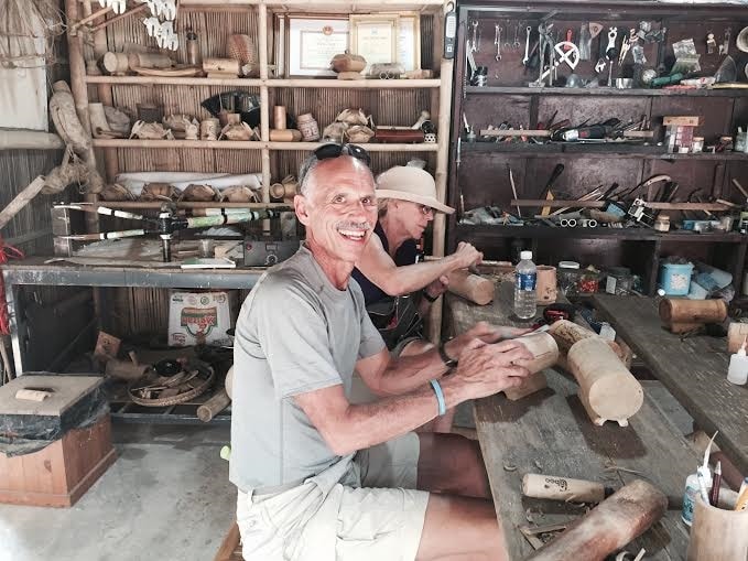 Handcrafted: Tourists practise bamboo crafts at a shop in Cẩm Thanh village, near Hội An city. The shop offers a two-hour course for visitors on how to make bamboo souvenirs.