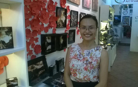 Đỗ Trang ở cửa hàng Combolac của cô. Ảnh: T.Đ.T