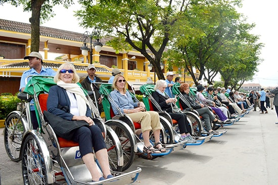 Du khách đến Hội An ngày càng tăng.  Ảnh: V.LỘC
