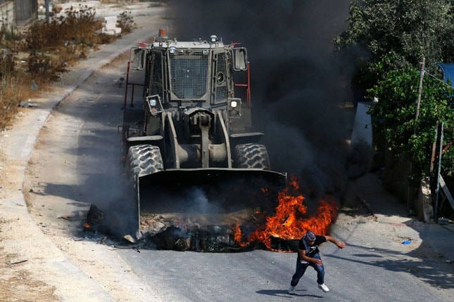 Xung đột diễn ra ở làng Kobar, phía tây thành phố Ramallah ở Bờ Tây. Ảnh: AFP