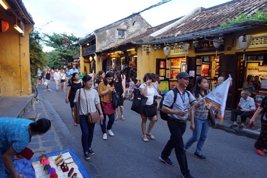 Malaysian visitors at Hoi An ancient quarter.