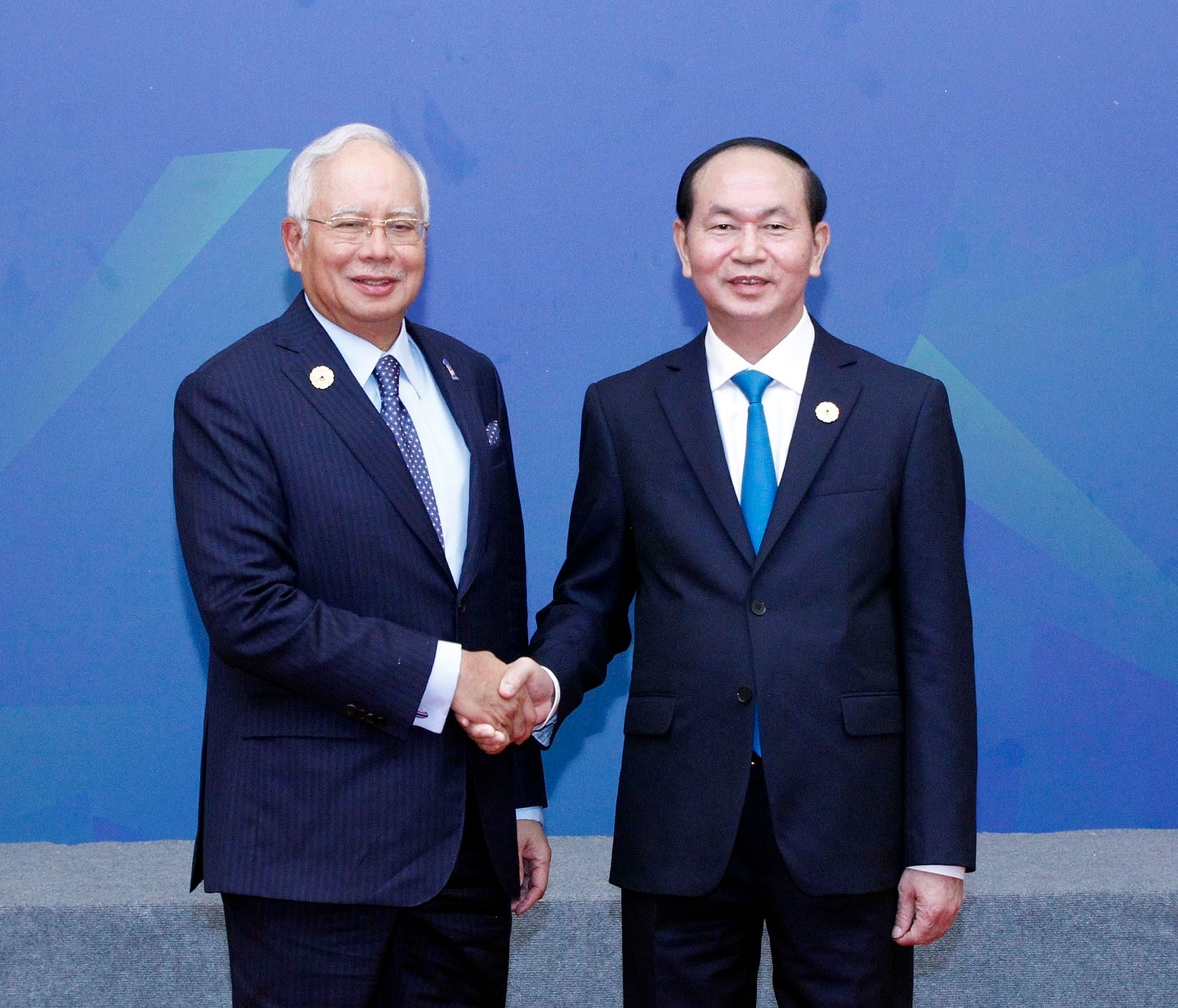 Chủ tịch nước Trần Đại Quang đón Thủ tướng Malaysia Najib Razak đến dự Đối thoại. 