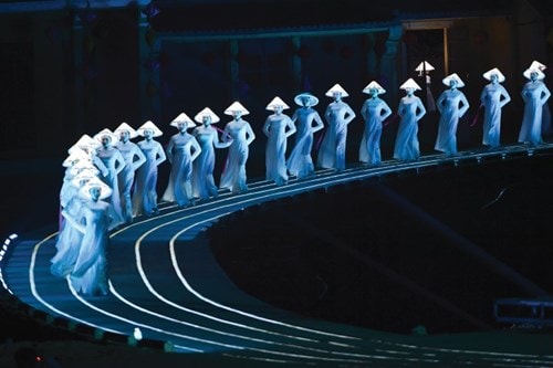 The girls in ao dai are stepping on the time route.