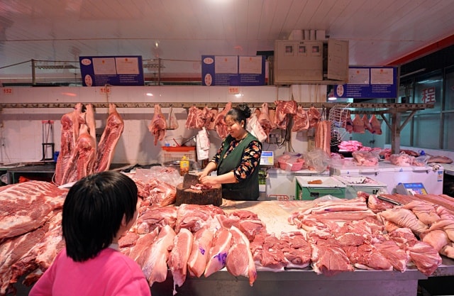 Trung Quốc là nơi tiêu thụ lượng thịt heo nhiều nhất thế giới. Ảnh: AFP