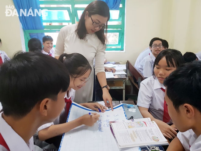 Thảo luận nhóm trong một tiết học ngoại ngữ tại Trường THCS Lý Thường Kiệt. Ảnh: T.T