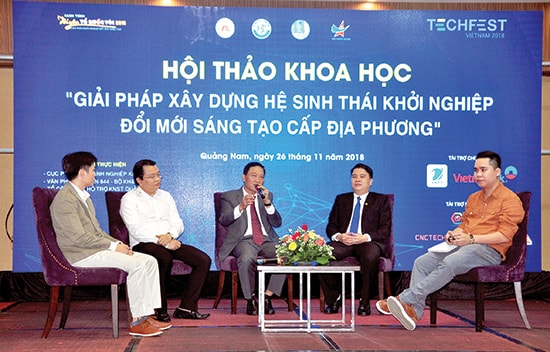 Các đại biểu thảo luận tại hội thảo. Ảnh:VINH ANH