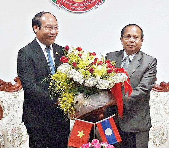 Chairman Ca (Left) and the Deputy Governor of Laos’ Sekong province.