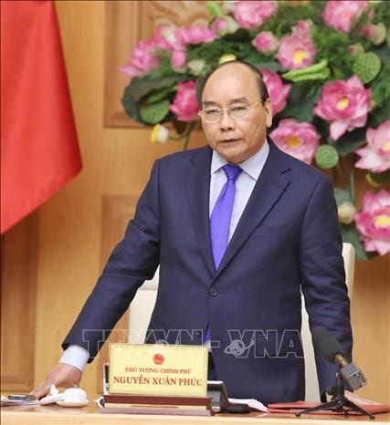 Thủ tướng Nguyễn Xuân Phúc chủ trì cuộc họp. Ảnh: Thống Nhất/TTXVN
