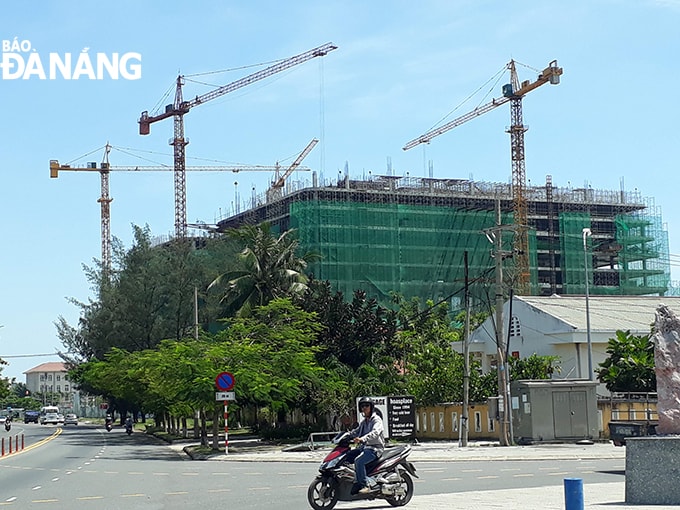 Phòng chuyên môn của các quận, huyện được phép thẩm định thiết kế công trình nhà ở riêng lẻ dưới 7 tầng và các dự án đầu tư vốn ngoài ngân sách từ ngày 2-3-2020. Ảnh: TRIỆU TÙNG