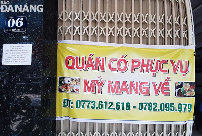 Kể từ 0 giờ ngày 2-4, tất cả các quán phục vụ ăn uống bán hàng qua mạng hoặc bán mang đi phải tạm dừng hoạt động. Ảnh: KHÁNH HÒA