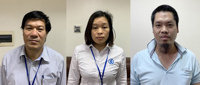 Ông Nguyễn Nhật Cảm (bên trái) - Giám đốc CDC Hà Nội đã bị khởi tố và bắt tạm giam. (Ảnh: Bộ Công an)