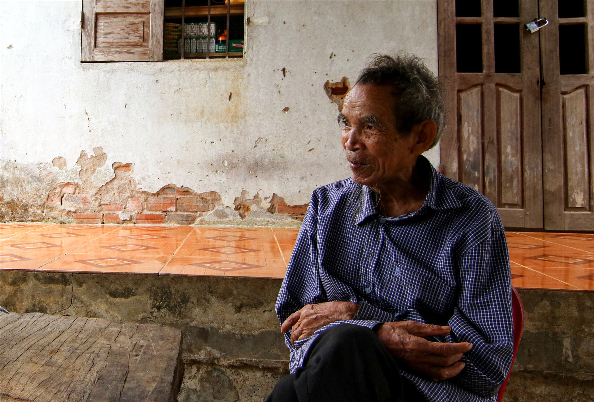 Ông Hồ Văn Loan, người duy nhất trong số 11 người đội tự vệ làng ông Tía còn sống. Ảnh: T.C
