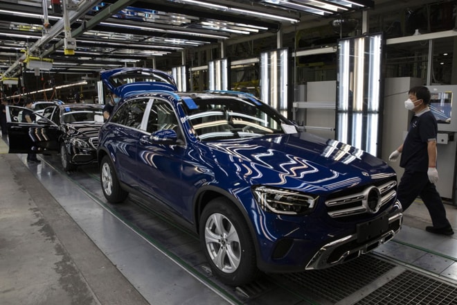 Các cơ sở sản xuất ở Trung Quốc đã hoạt động trở lại. Ảnh: AP