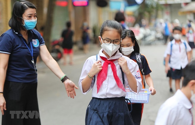 Học sinh trên cả nước đi học sau khi dịch bệnh Covid-19 được đẩy lùi. (Ảnh: Thành Đạt/TTXVN)