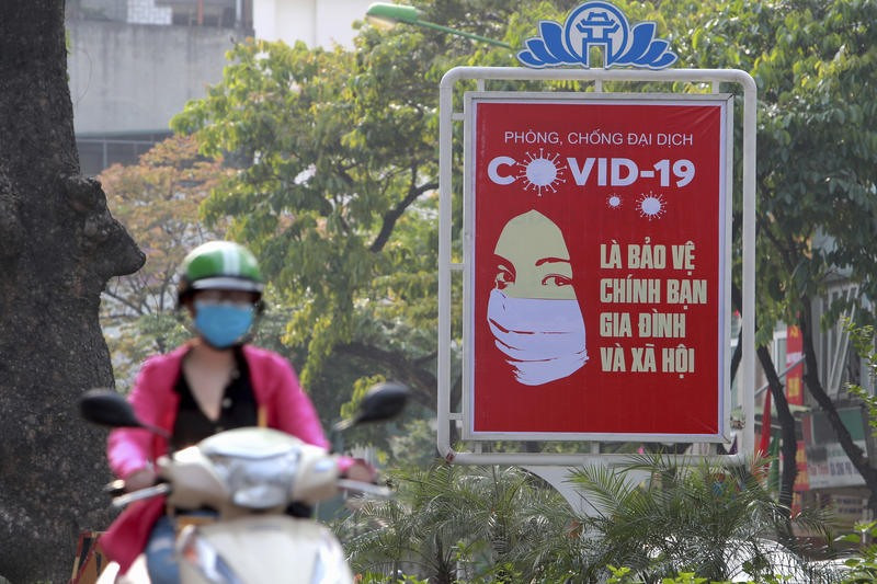 Trang web của GAVI là một trong những kênh thông tin quốc tế ca ngợi thành công của Việt Nam trong cuộc chiến đẩy lùi Covid-19 tính đến thời điểm này. Ảnh: AP
