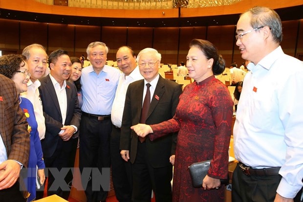Tổng Bí thư, Chủ tịch nước Nguyễn Phú Trọng, Thủ tướng Nguyễn Xuân Phúc, Chủ tịch Quốc hội Nguyễn Thị Kim Ngân với các đại biểu. (Ảnh: Doãn Tấn/TTXVN)