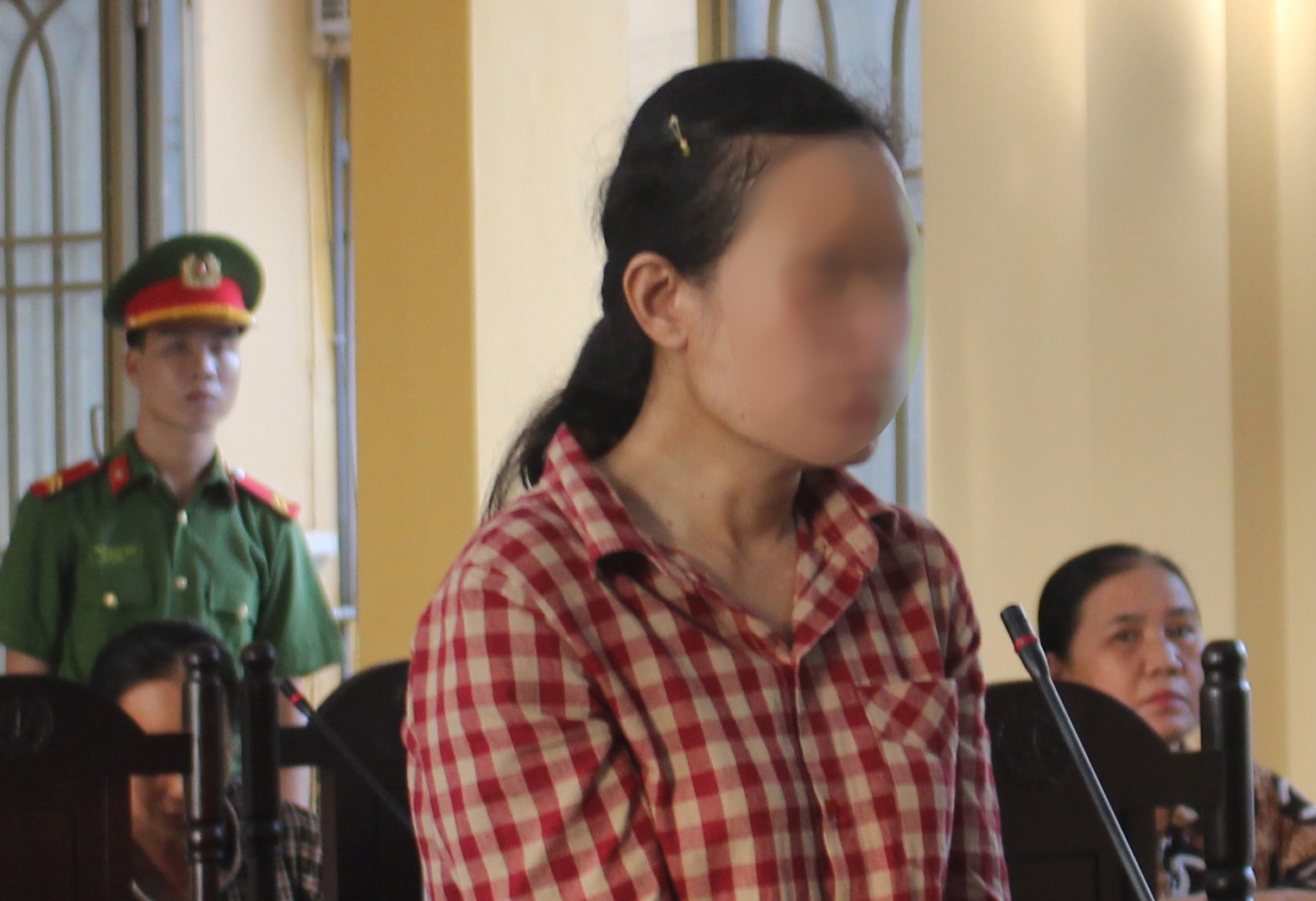 Đối tượng Phạm Thị Nghĩa bị tuyên phạt 11 năm tù giam, buộc khắc phục thiệt hại cho những nạn nhân. Ảnh: T.C