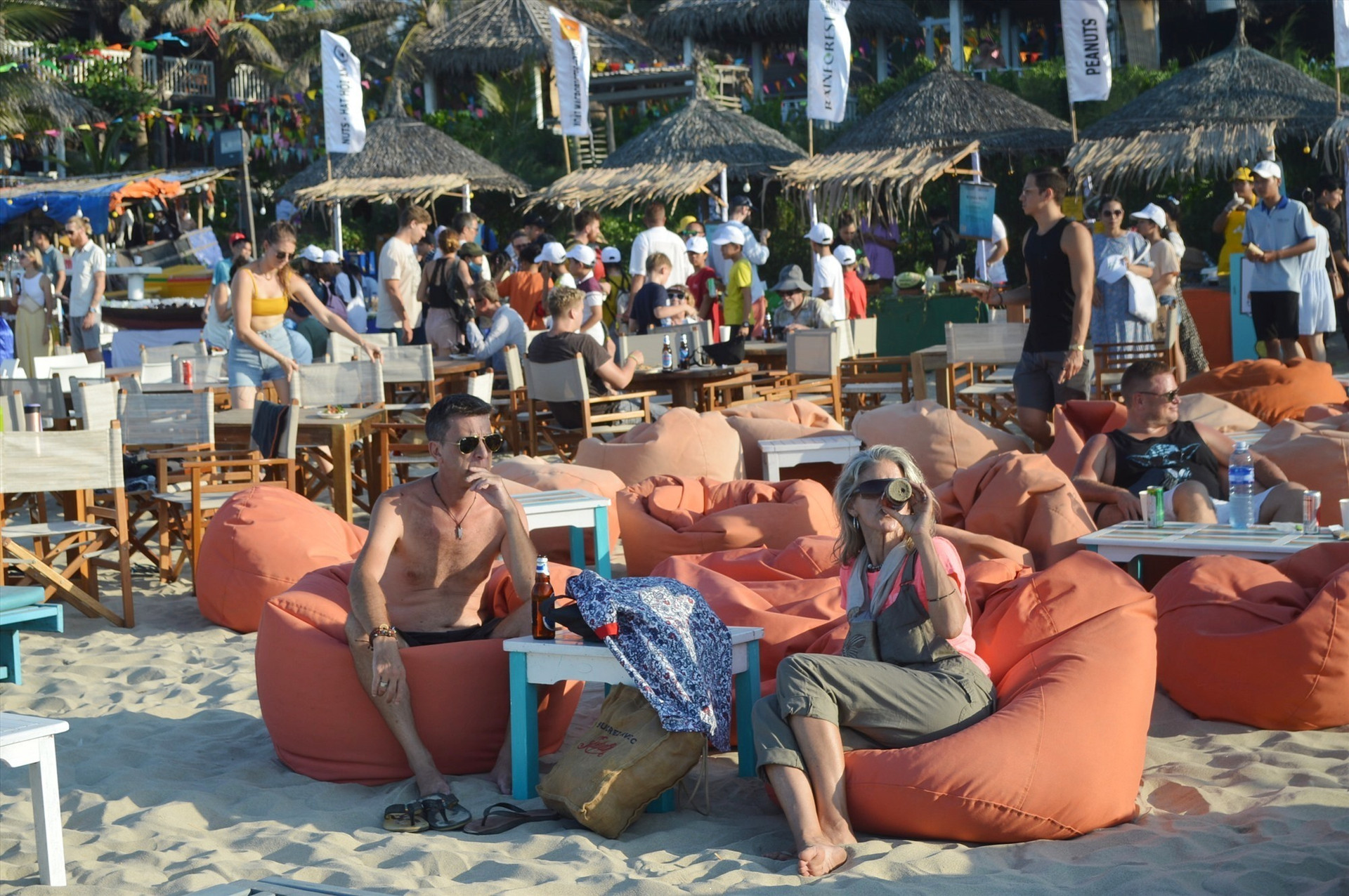 Tourists are waiting for the festival at the beach
