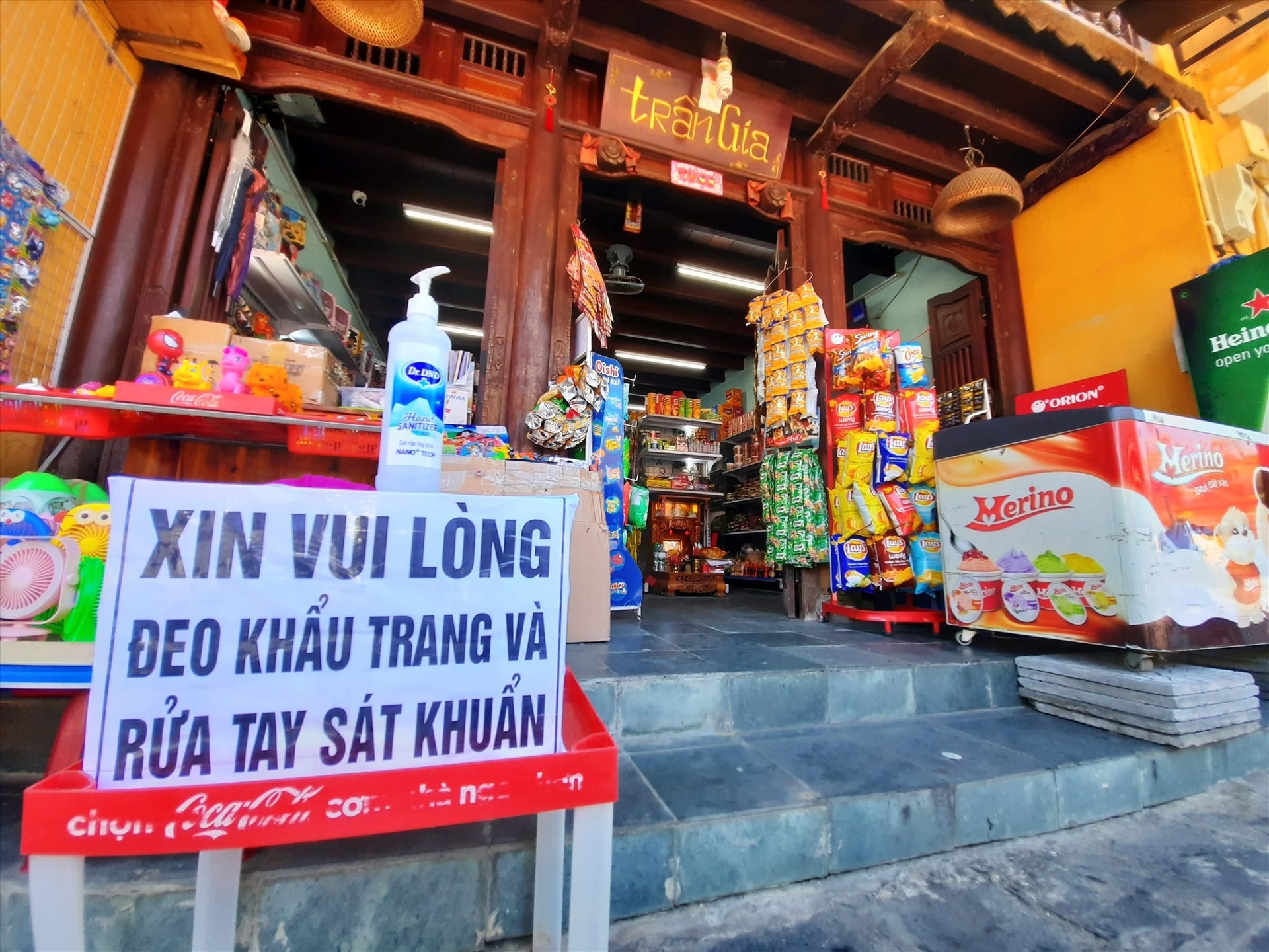 Reminders of wearing face masks and using antiseptic wash products in Hoi An