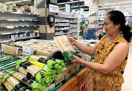 A consumer with Caromi cassava noodles