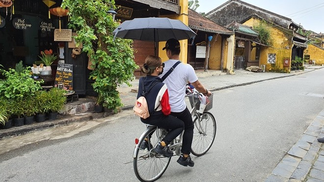 More and more young people go to Hoi An.