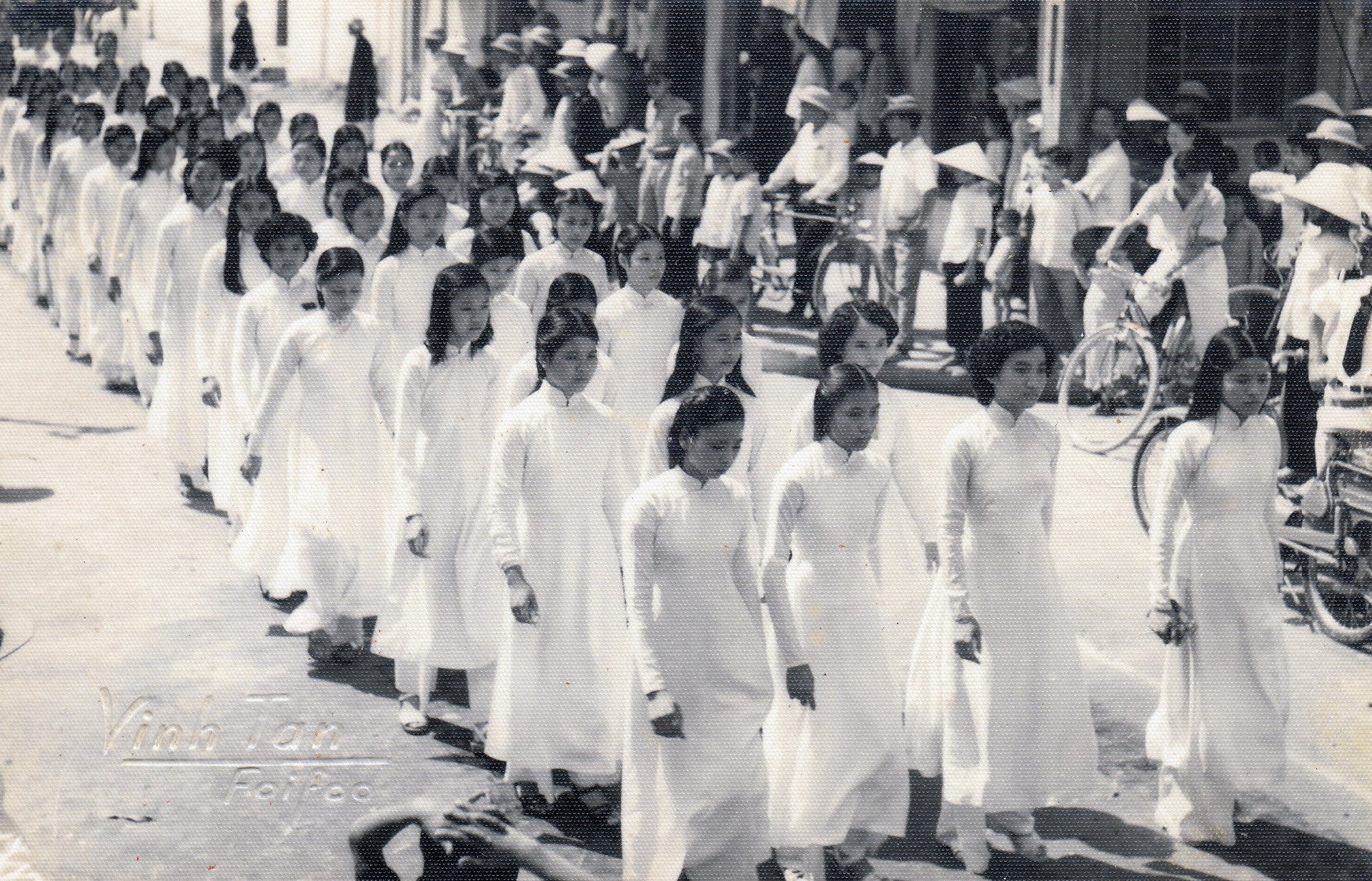 “Ao dai” in a street protest in Hoi An