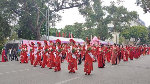 In the mind of Vietnamese people and the eyes of international friends, Ao Dai is a symbol of Vietnamese culture and quintessence. (Photo: VNA)