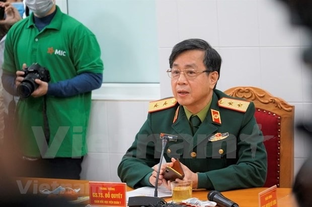Prof. Dr. Do Quyet, Director of the Military Medical Academy, speaks to the press following the trial vaccination. (Photo: VNA)