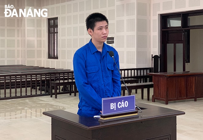 Bị cáo Phạm Quốc Việc tại tòa sáng 26-1. Ảnh: XUÂN DŨNG
