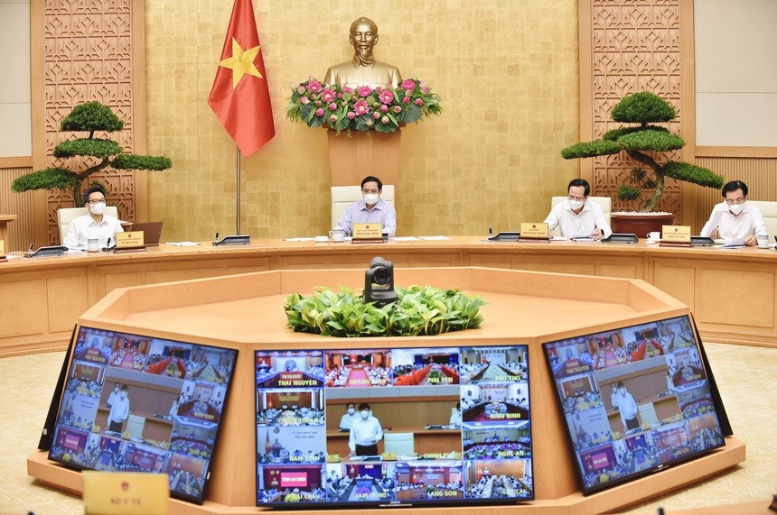 Thủ tướng Phạm Minh Chính chủ trì hội nghị trực tuyến chống dịch. Ảnh: VGP.