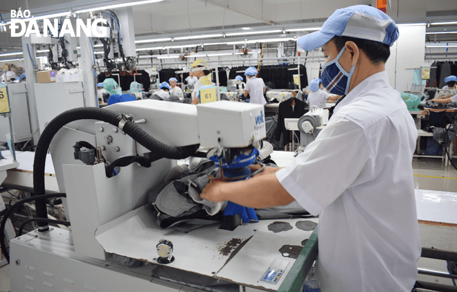 Việc Quỹ Đầu tư phát triển cho vay ưu đãi giúp doanh nghiệp mở rộng sản xuất, kinh doanh. Ảnh: KHÁNH HÒA