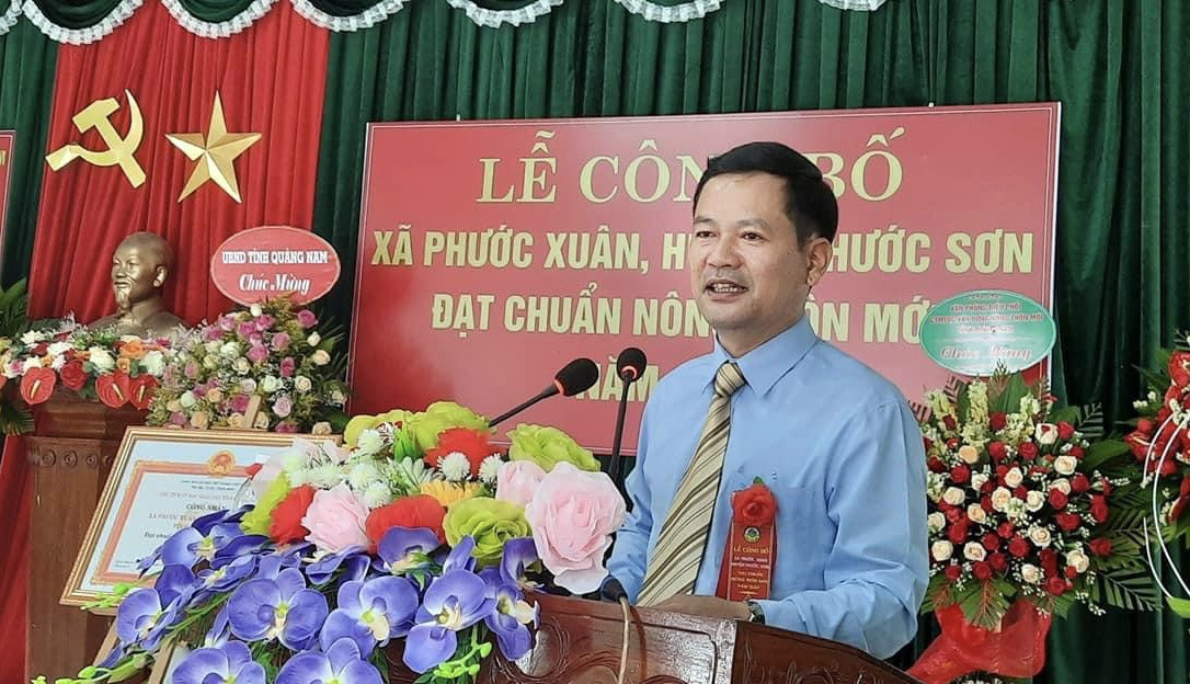 Ông Lê Quang Trung phát biểu tại lễ công bố xã đạt chuẩn NTM.