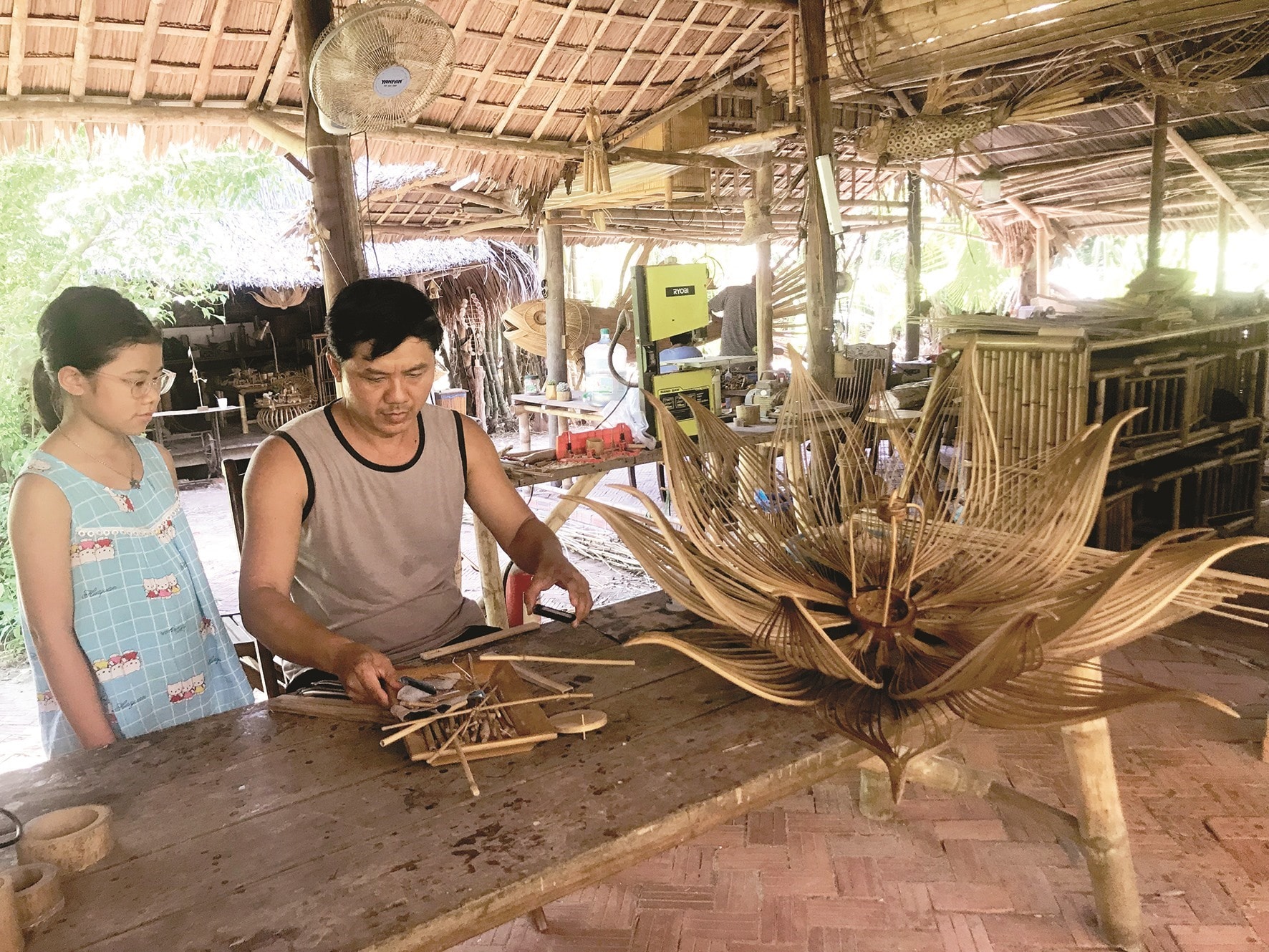 A lotus-shaped lantern made of bamboo.