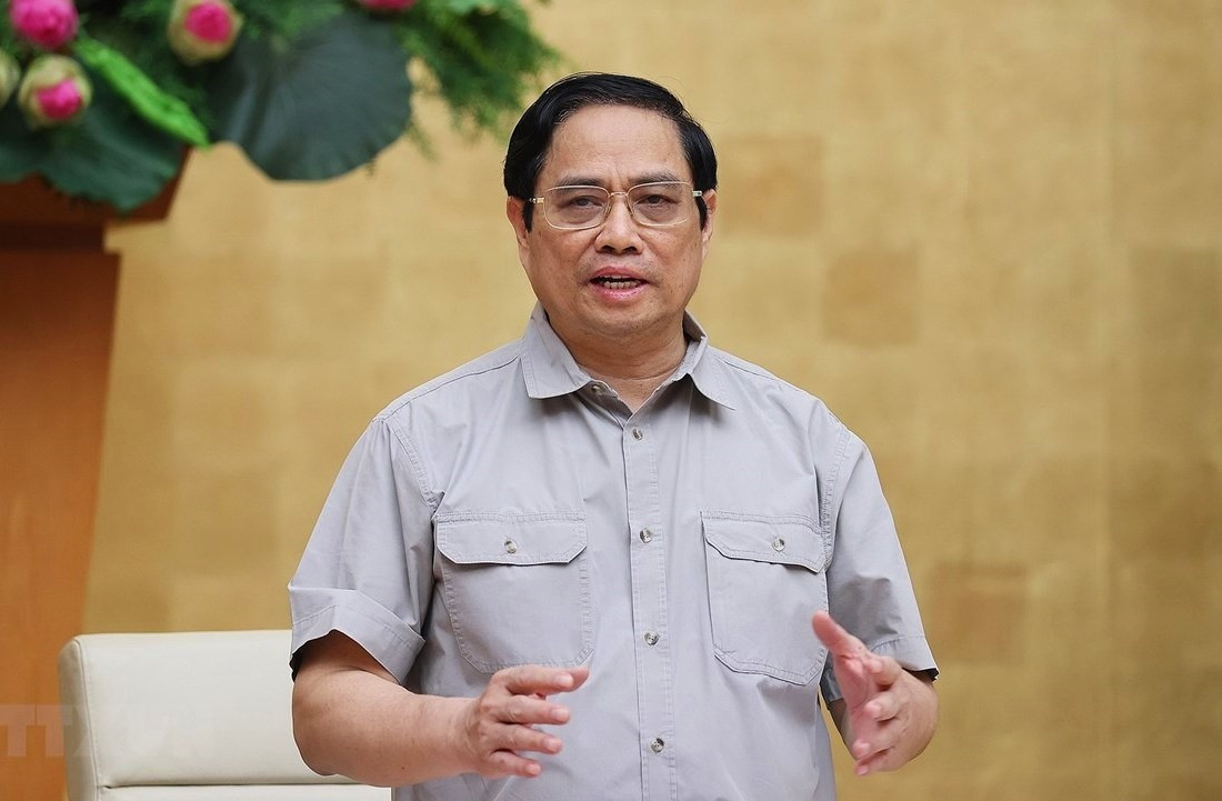 Thủ tướng Phạm Minh Chính, Trưởng Ban Chỉ đạo Quốc gia phòng, chống dịch COVID-19 chủ trì cuộc họp. Ảnh: Dương Giang/TTXVN.