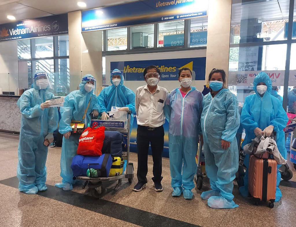 Phụ nữ mang thai được hỗ trợ đưa về quê Quảng Nam hôm 4.10 vừa qua.