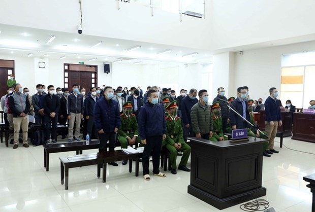 Các bị cáo tại Phiên tòa. (Ảnh: Phạm Kiên/TTXVN)