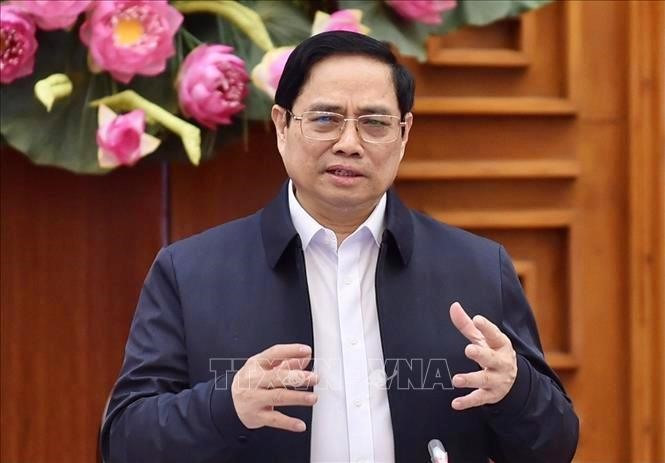Thủ tướng Phạm Minh Chính chủ trì cuộc họp về thúc đẩy sản xuất vaccine. Ảnh: Dương Giang/TTXVN