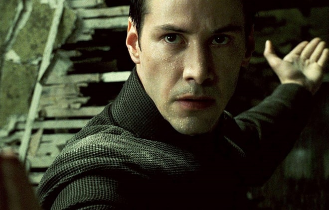 Diễn viên Keanu Reeves thủ vai hacker Neo trong phim “Ma trận: Hồi sinh”. Ảnh: The Guardian