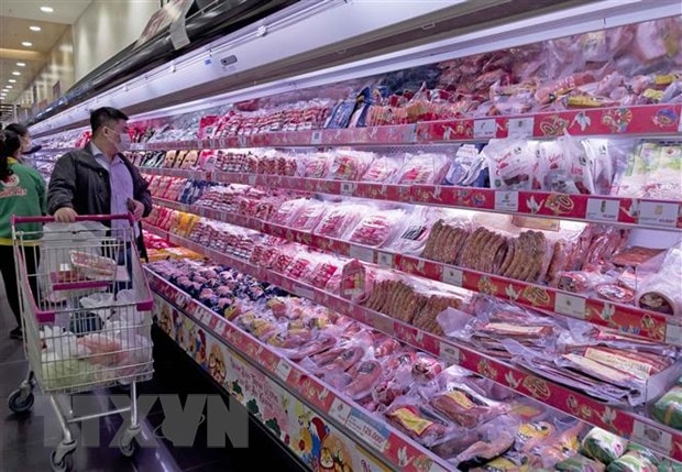 Người dân mua sắm tại siêu thị Aeon Long Biên, Hà Nội. (Ảnh: Trần Việt/TTXVN)