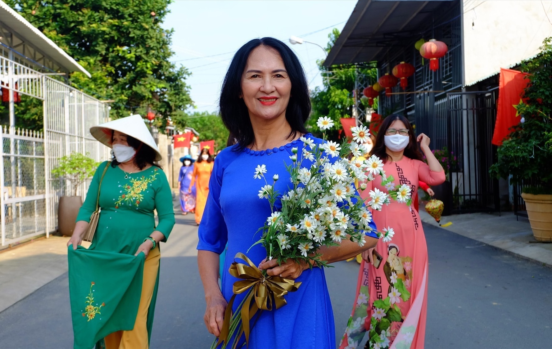 Middle-aged women in Ao dai