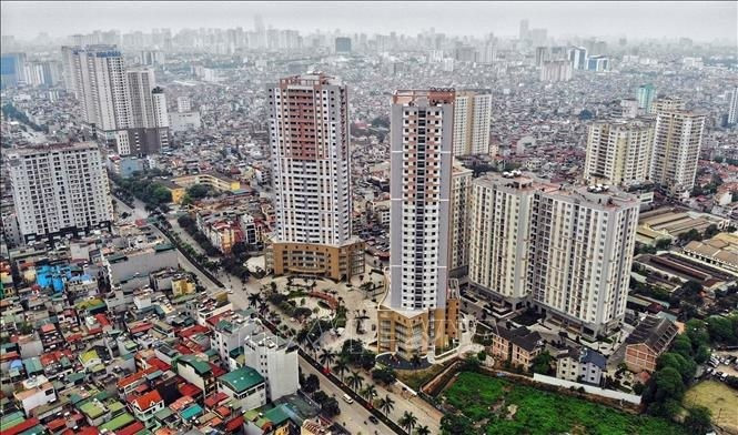 Theo Vietnam Report, ngành bất động sản sẽ bứt tốc trong năm 2022 và các năm tới. Ảnh minh họa: Danh Lam/TTXVN