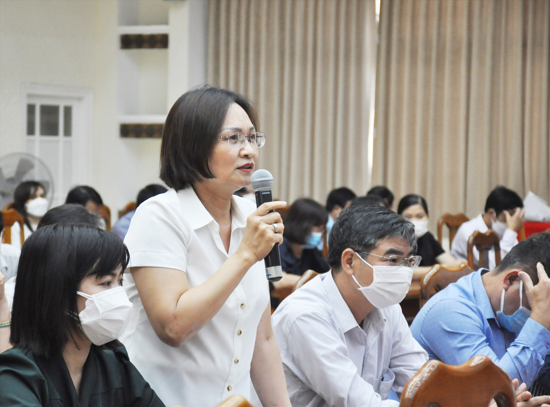 Bà Huỳnh Thị Mỹ Nhân phát biểu tại cuộc đối thoại. Ảnh: N.Đ