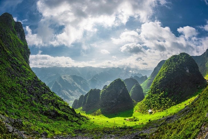 The emerald-green karst mountain landscapes along Ha Giang's mountain passes make this far-north province prime territory for scenic road-tripping by either motorbike or car.