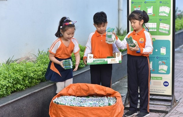 A new carton recycling initiative aims to collect and fully recycle 3,000 tonnes of used drink cartons into new products. (Photo: VNA)